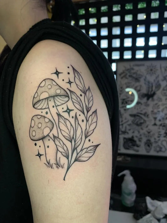 Medium Linework Mushrooms and Leaves on Women Arm Tattoo by @elite.ink.westcliff
