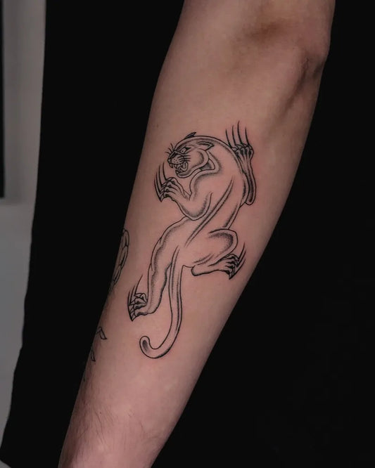 Medium Linework Panther Tattoo on Men Arm by @minoru.tattoo