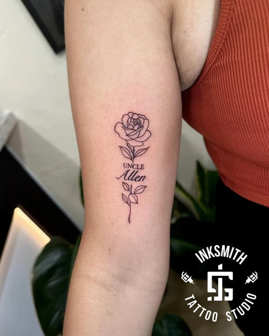 Medium Linework Rose with Uncle Allen Text on Women Arm Tattoo by @inksmithtattoobda