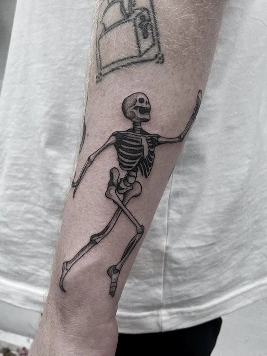 Medium Linework Skeleton Tattoo on Men Arm by @ensorcelltattoo