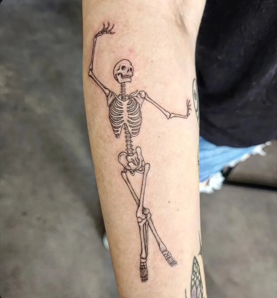 Medium Linework Skeleton Tattoo on Women Arm by @berzerkerella