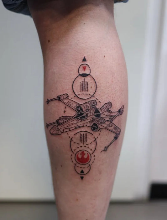 Medium Linework Star Wars X Wing Rebel Symbol Tattoo on Men Leg by @nuah_ink
