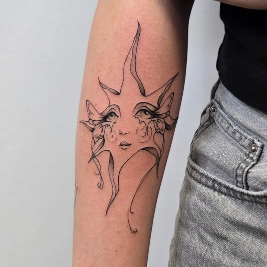 Medium Linework Sun Face on Women Arm Tattoo by @sofietatts