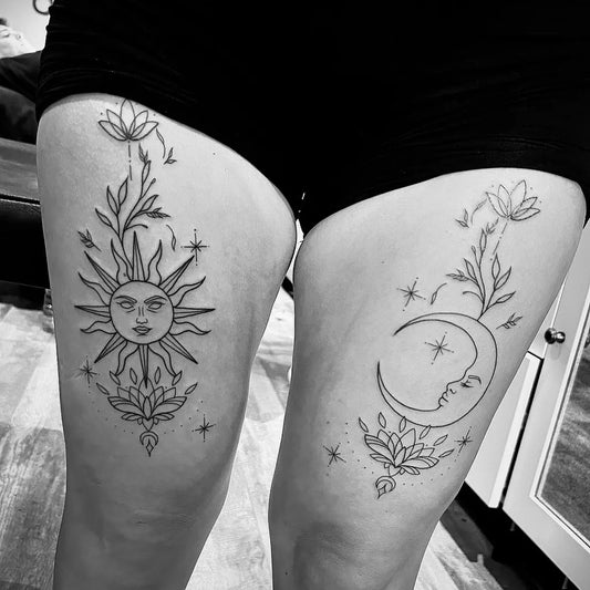 Medium Linework Sun Moon Flowers on Women Thigh Tattoo by @adamleecoaleytattoos