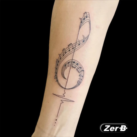Medium Linework Treble Clef and Notes Music Tattoo on Women Arm by @zerbi_tattoo