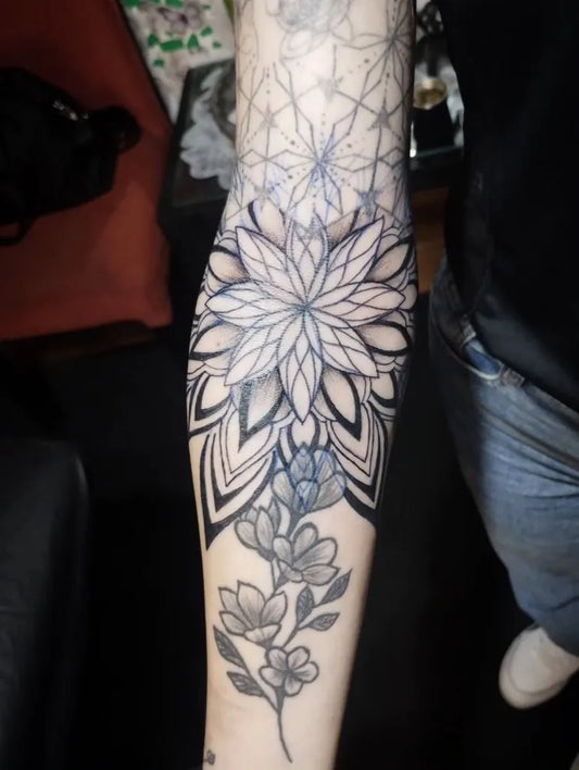 Medium Mandala Blackwork Mandala and Flowers Tattoo on Women Arm by @j.dolcetattoo