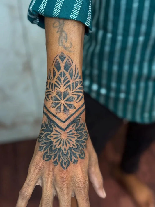 Medium Mandala Mandala Band Tattoo on Men Wrist by @tattoo_by_ram_25