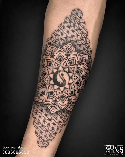 Medium Mandala Yin Yang Tattoo on Men Forearm by @gunsandinkstattoos