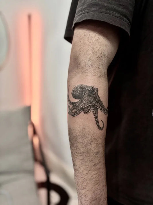 Medium Micro Realism Octopus Tattoo on Men Arm by @guysvl