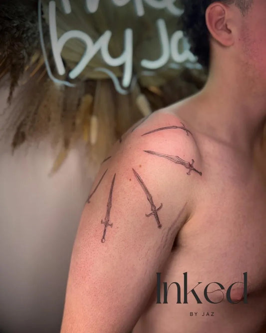 Medium Minimalist Dagger Cluster on Men Shoulder Tattoo by @inked_byjaz_