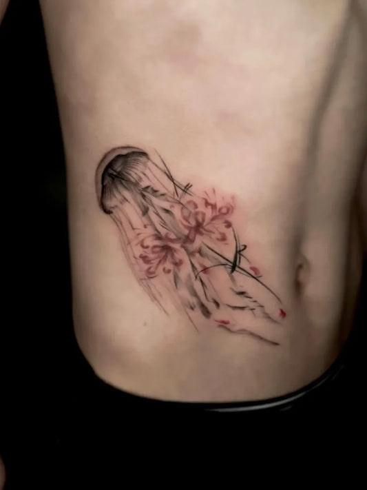 Medium Minimalist Jellyfish and Cherry Blossoms Tattoo on Men Side by @hazetattooist