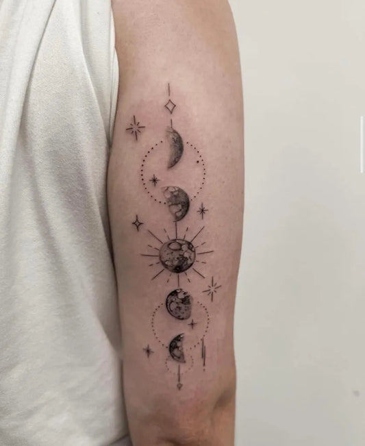 Medium Minimalist Moon Phases and Stars Tattoo on Women Arm by @sunset_tattoo_nz