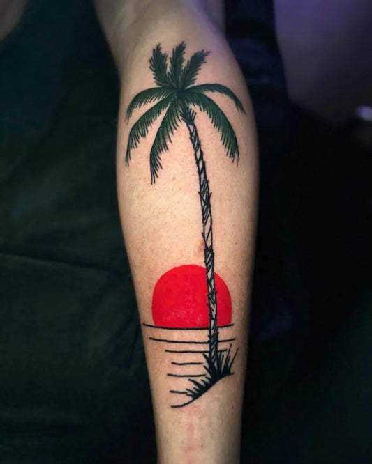 Medium Minimalist Palm Tree Sunset Tattoo on Men Arm by @renot_aragontattoo
