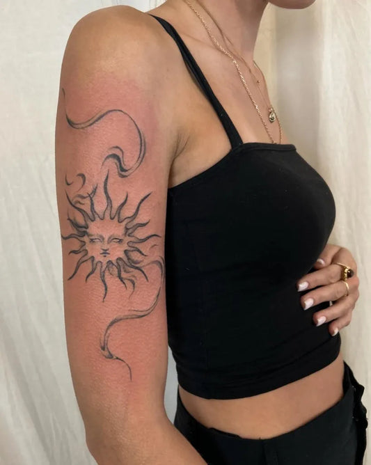 Medium Minimalist Sun with Waves on Women Upper Arm Tattoo by @diana.tusz