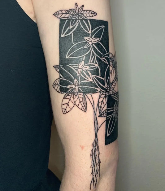 Medium Negative Space Floral Leaves Tattoo on Men Arm by @stabnyoo