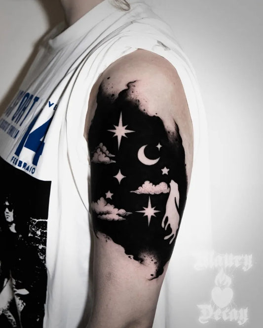 Medium Negative Space Moon Stars Clouds Tattoo on Men Arm by @maurydecay_tattoos
