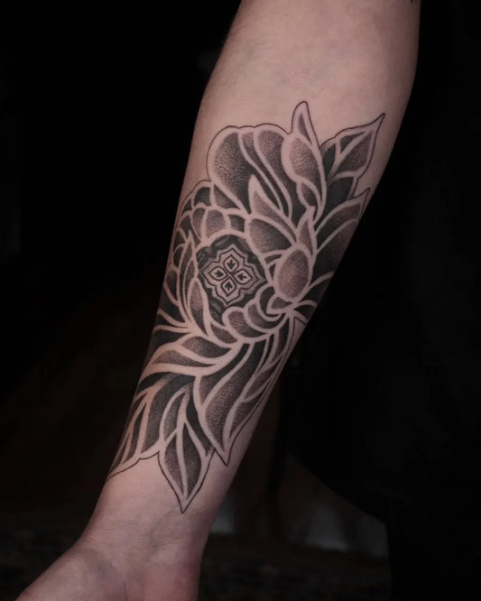 Medium Negative Space Peony Flower Tattoo on Women Arm by @afinemadness.tattoo_studio