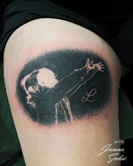 Medium Negative Space Portrait with Raised Hands and L Tattoo on Women Thigh by @jo.socha_tattoo