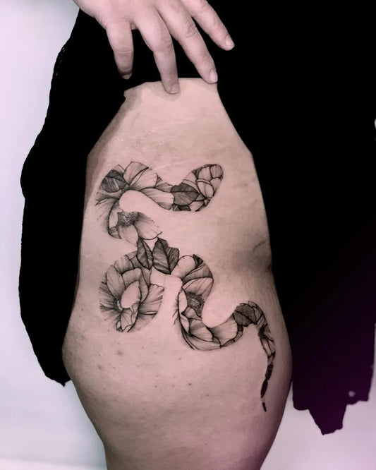 Medium Negative Space Snake Tattoo on Women Thigh by @medusenoire_tattoo