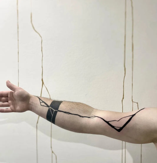 Medium Negative Space Thin Lines Tattoo on Men Arm by @sanne_vaghi