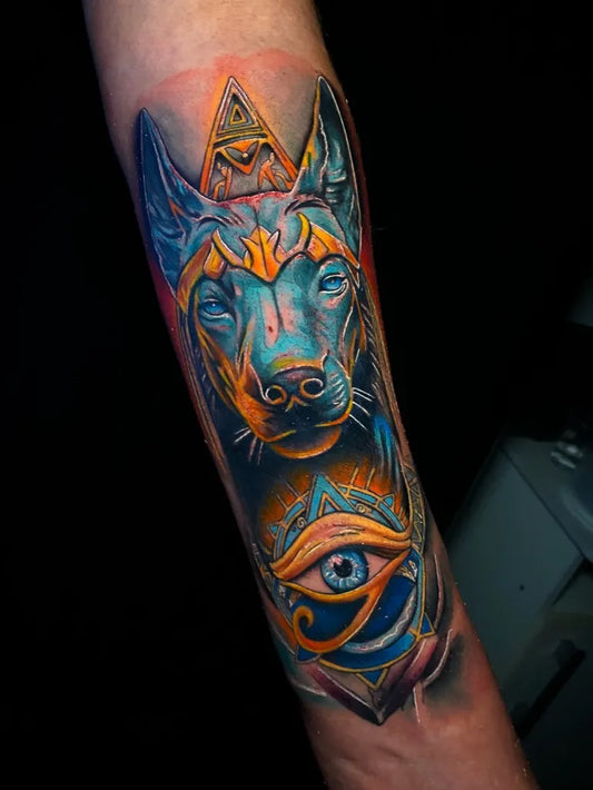 Medium Neo Traditional Anubis Eye of Horus Tattoo on Women Arm by @latronicotattoo