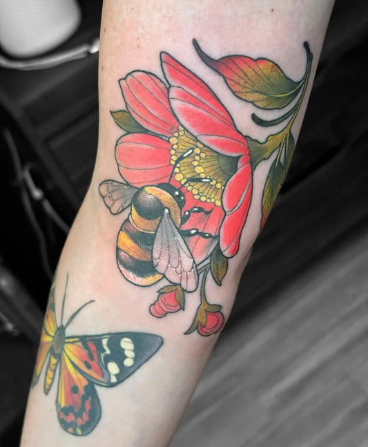 Medium Neo Traditional Bee Flower Butterfly on Women Arm Tattoo by @alexgregorytattoo