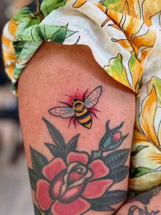 Medium Neo Traditional Bee Rose Bud on Women Arm Tattoo by @ochoatattoos