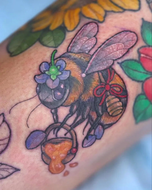 Medium Neo Traditional Bee with Flowers on Women Arm Tattoo by @mariloutattoos