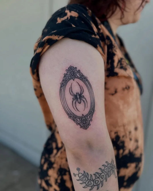 Medium Neo Traditional Black Widow Spider in Ornate Frame on Women Arm Tattoo by @andromedaerie