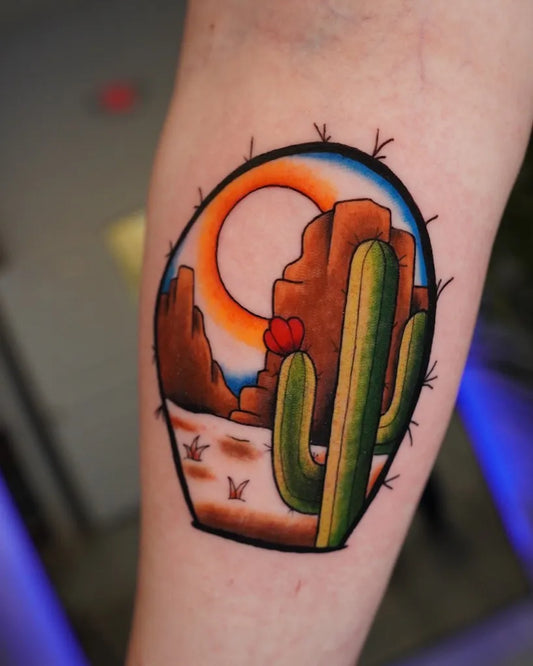 Medium Neo Traditional Cactus Desert Sun Tattoo on Women Arm by @owl_be_drawing