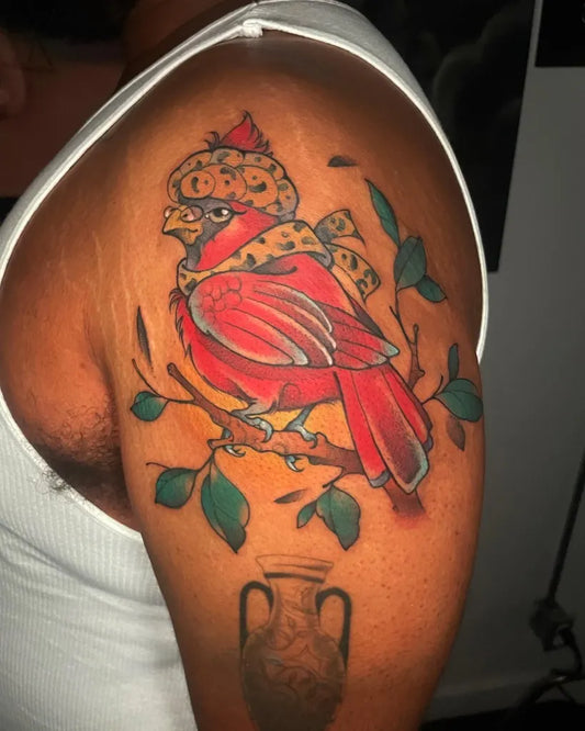 Medium Neo Traditional Cardinal with Crown and Vase Tattoo on Men Arm by @_heavyaxes_tattoos