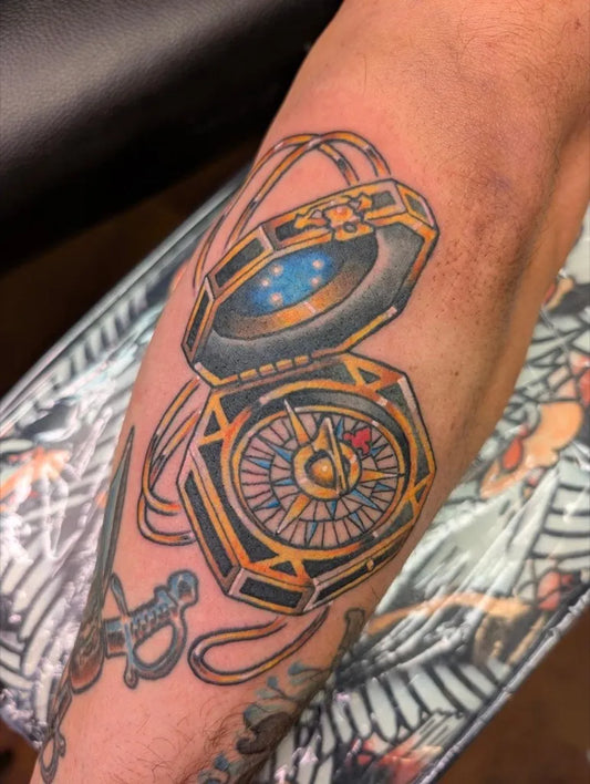 Medium Neo Traditional Compass and Sword on Men Arm Tattoo by @lockett.tattoos