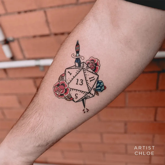 Medium Neo Traditional Dagger Dice Roses Tattoo on Men Arm by @cbinktattoobrisbane