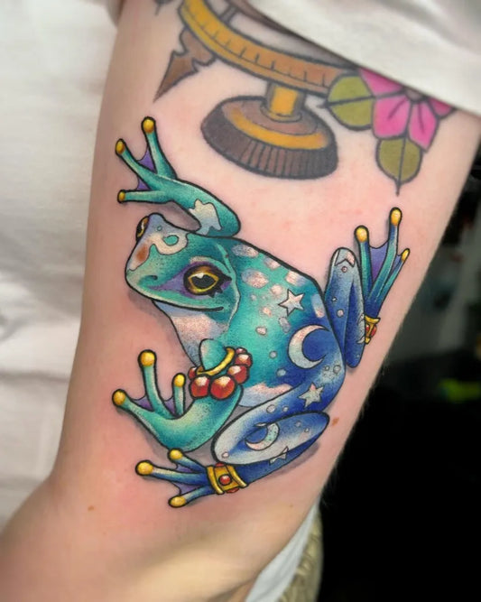 Medium Neo Traditional Frog with Moon and Stars Tattoo on Women Arm by @deku_tats