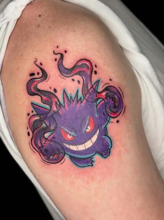 Medium Neo Traditional Gengar Pokemon Tattoo on Women Shoulder by @tokiyokoblaqtattoos