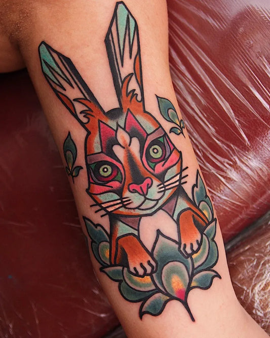Medium Neo Traditional Geometric Hare Lotus Tattoo on Men Bicep by @jimmyduvall