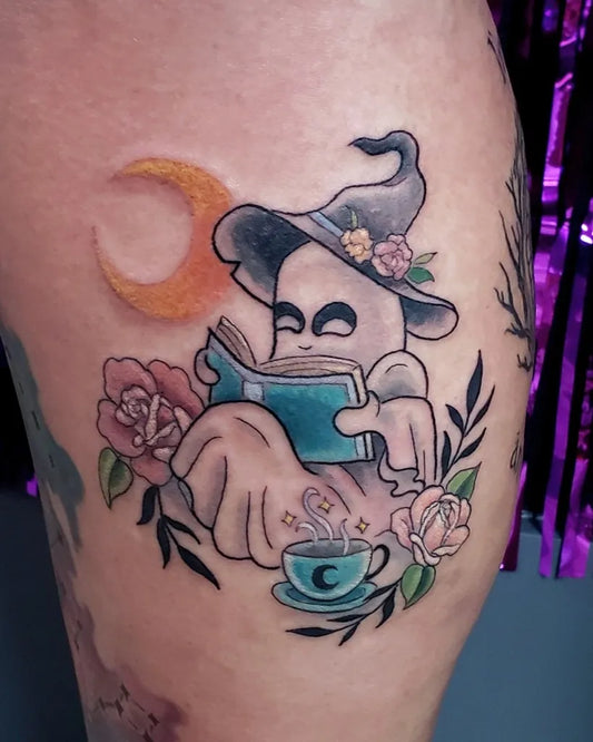 Medium Neo Traditional Ghost Reading Book Tattoo on Women Thigh by @alteredegotattoos