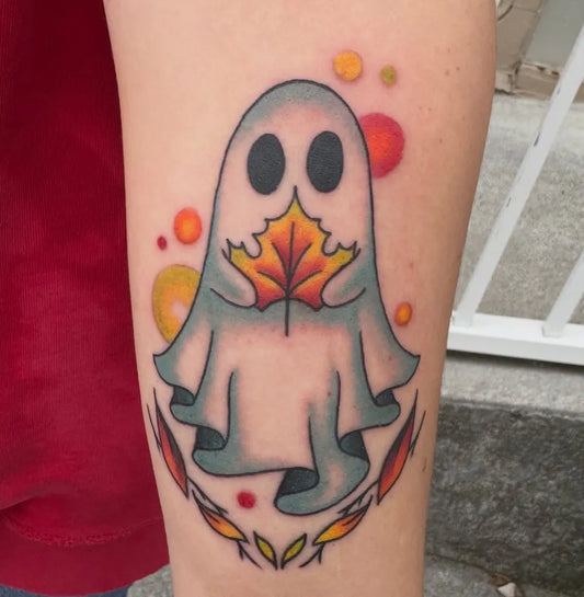 Medium Neo Traditional Ghost with Maple Leaf Tattoo on Women Arm by @jadek_art