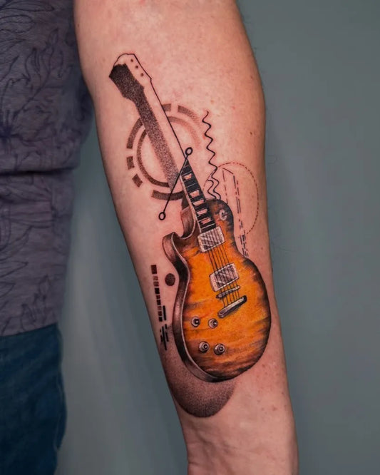 Medium Neo Traditional Gibson Guitar Music Tattoo on Men Arm by @szelmatattoo_wro