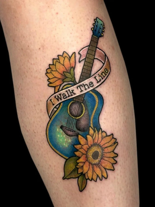 Medium Neo Traditional Guitar and Sunflowers Music Tattoo on Women Thigh by @outerlimitstattoo