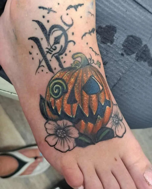 Medium Neo Traditional Halloween Pumpkin Bats Flowers Tattoo on Women Foot by @my_style_mom