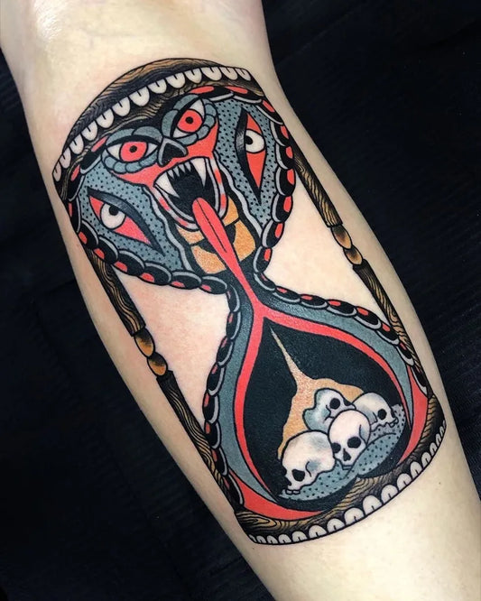 Medium Neo Traditional Hourglass with Snake and Skulls Tattoo on Women Arm by @tattoosnob