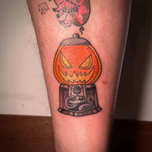 Medium Neo Traditional Jack o Lantern Gumball Machine with Pig Balloon Halloween Tattoo on Men Leg by @ink_hopper