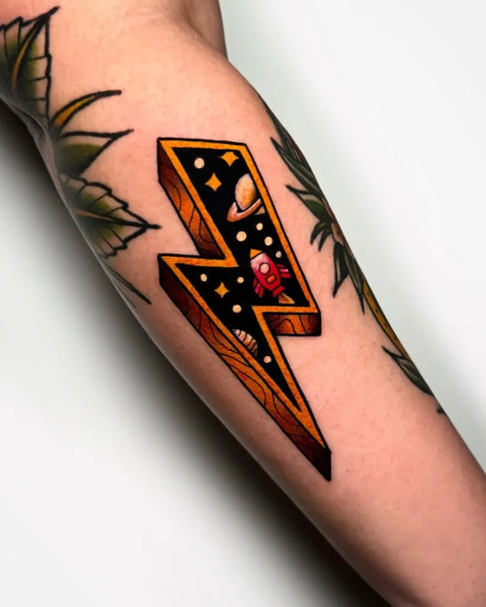 Medium Neo Traditional Lightning Bolt with Rocket and Stars Tattoo on Women Arm by @hh_tattoo