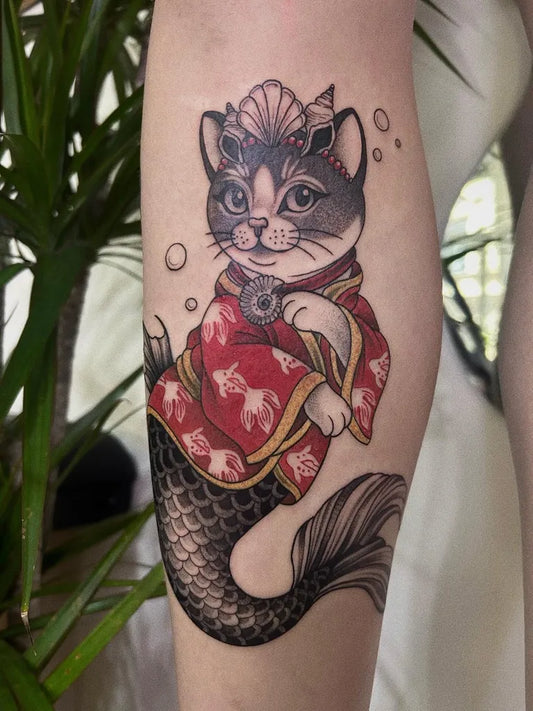 Medium Neo Traditional Mermaid Cat Tattoo on Women Thigh by @rekart.ink