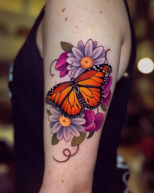 Medium Neo Traditional Monarch Butterfly Daisy Tattoo on Women Arm by @tattoosbysonja