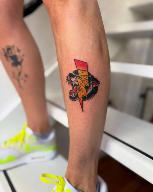 Medium Neo Traditional Panther Lightning Bolt Tattoo on Women Leg by @tamartielemantattoo