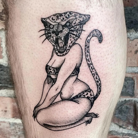 Medium Neo Traditional Pin Up Girl Leopard Tattoo on Women Thigh by @meganlee.tattoo