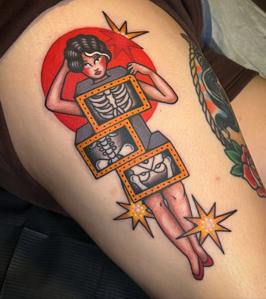 Medium Neo Traditional Pin Up Girl with X Ray Skeleton Tattoo on Women Thigh by @erinodea