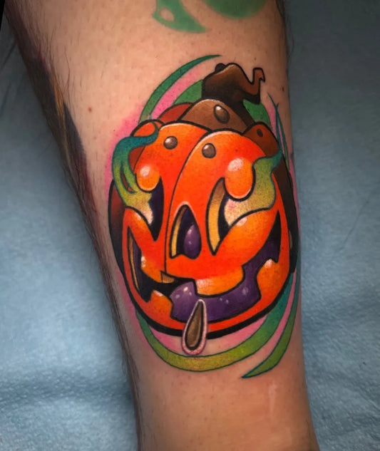 Medium Neo Traditional Pumpkin Halloween Tattoo on Women Leg by @oddtattoos